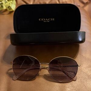 Coach Sunglasses with Gold Frame and Dark Lenses rose gold arms. Very good